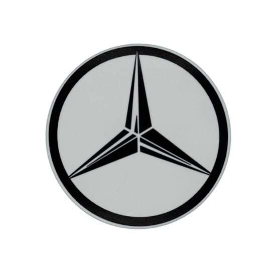 Runde Mercedes-Benz LED-Leuchte mit Logo in schwarz weiß beleuchtet