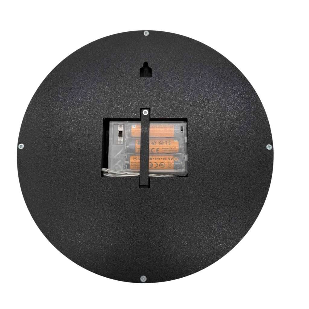 Rückseite der runden LED-Leuchte in schwarz mit Batteriefach