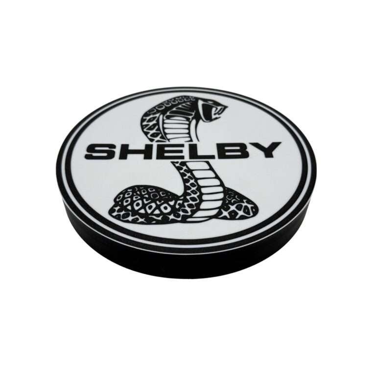 Runde Shelby LED-Lampe mit Logo in schwarz weiß beleuchtet